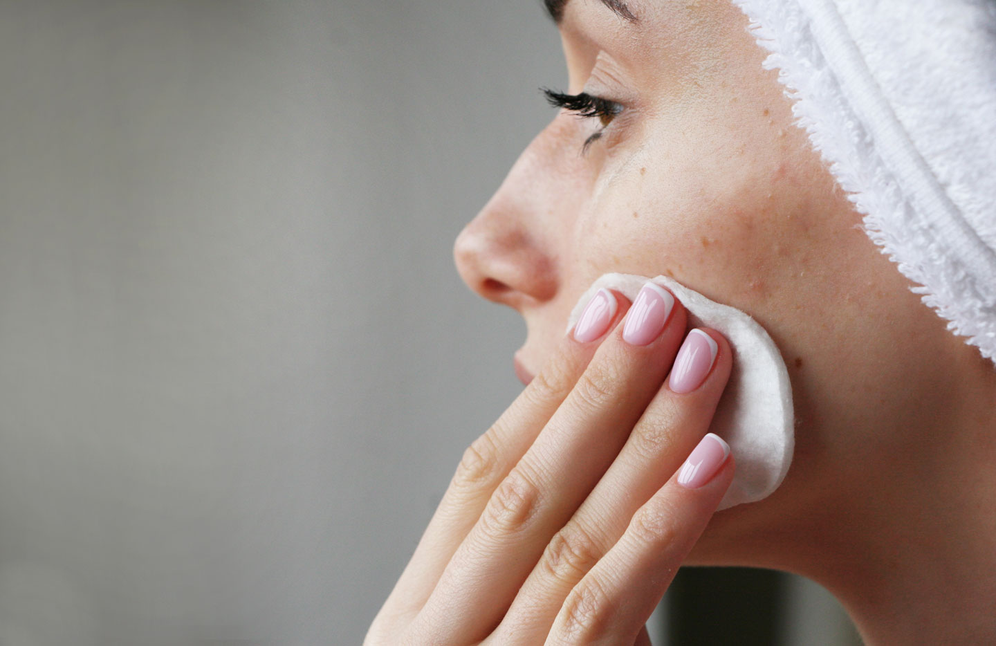 Girl cleaning face
